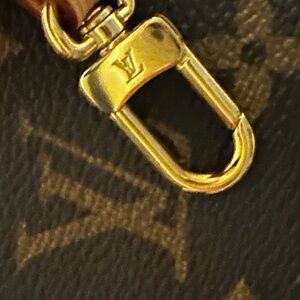Louis Vuitton Monogram Clutch with Gold Accents